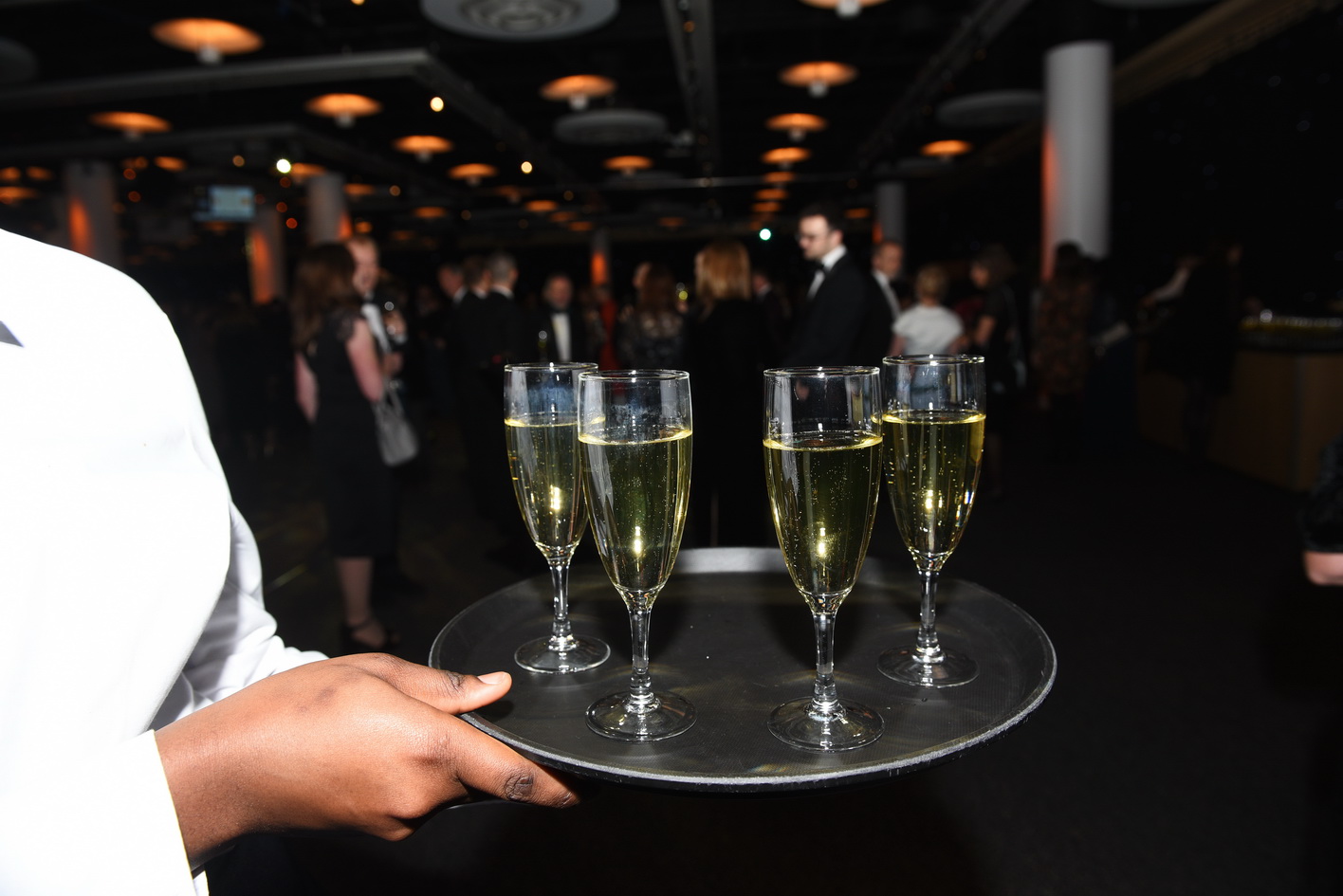 Drinks at an evening business reception photography