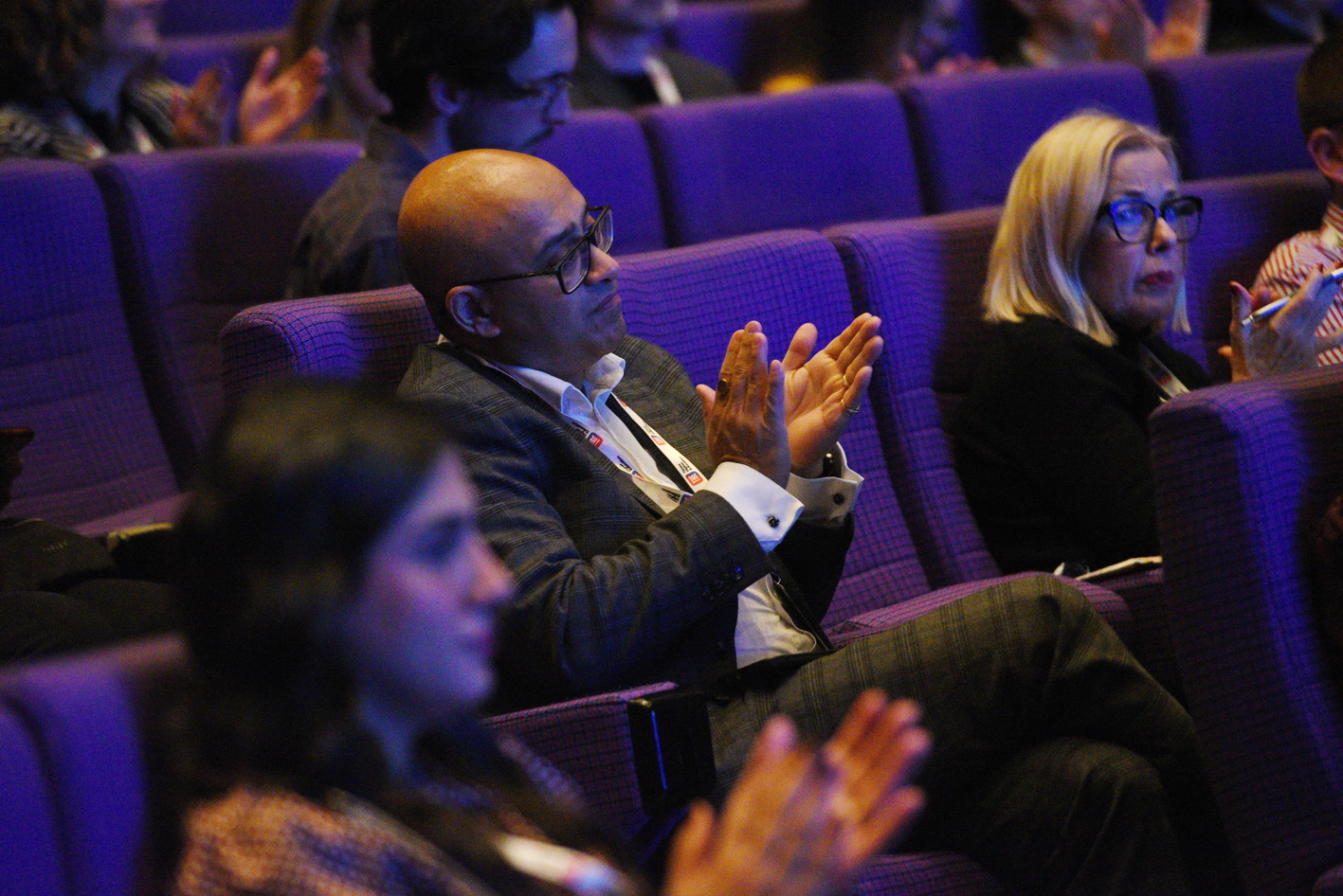 Conference photography engaged audience image example