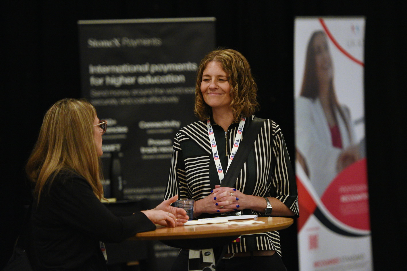 Interactions between delegates during a break at Conference photography