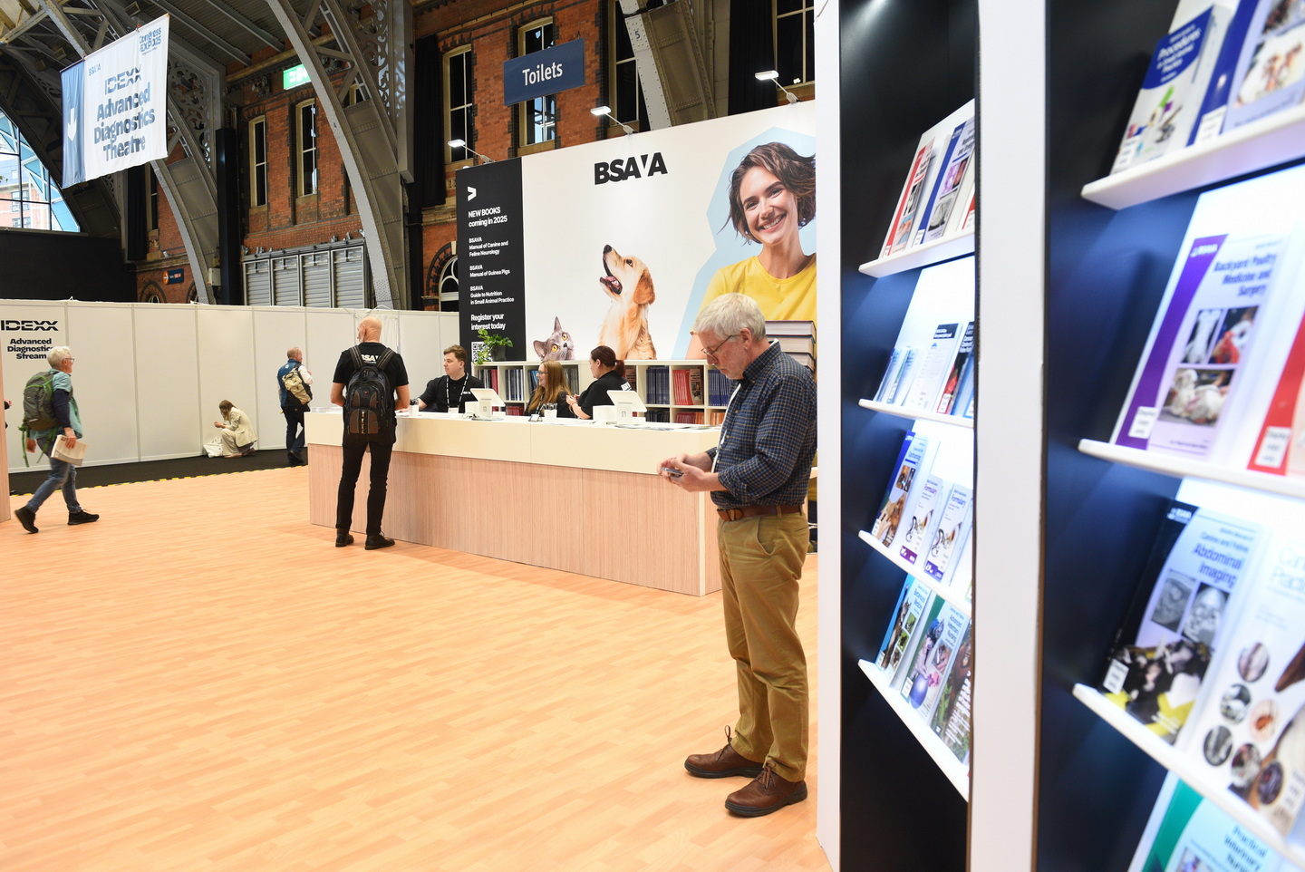 Busy exhibition hall with delegates and exhibitors