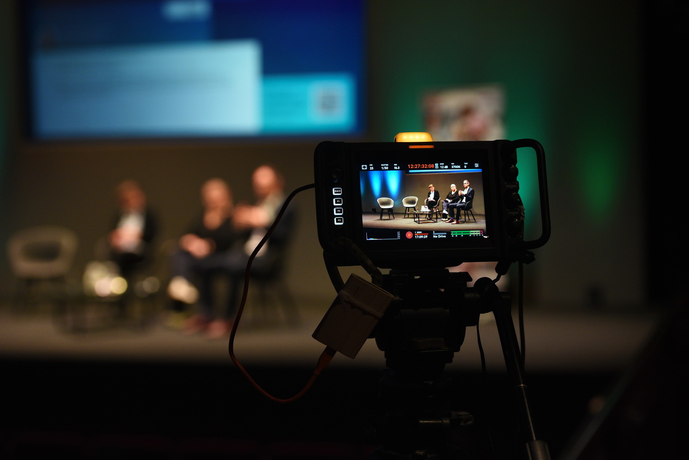 Multi-media conference with screens and staging