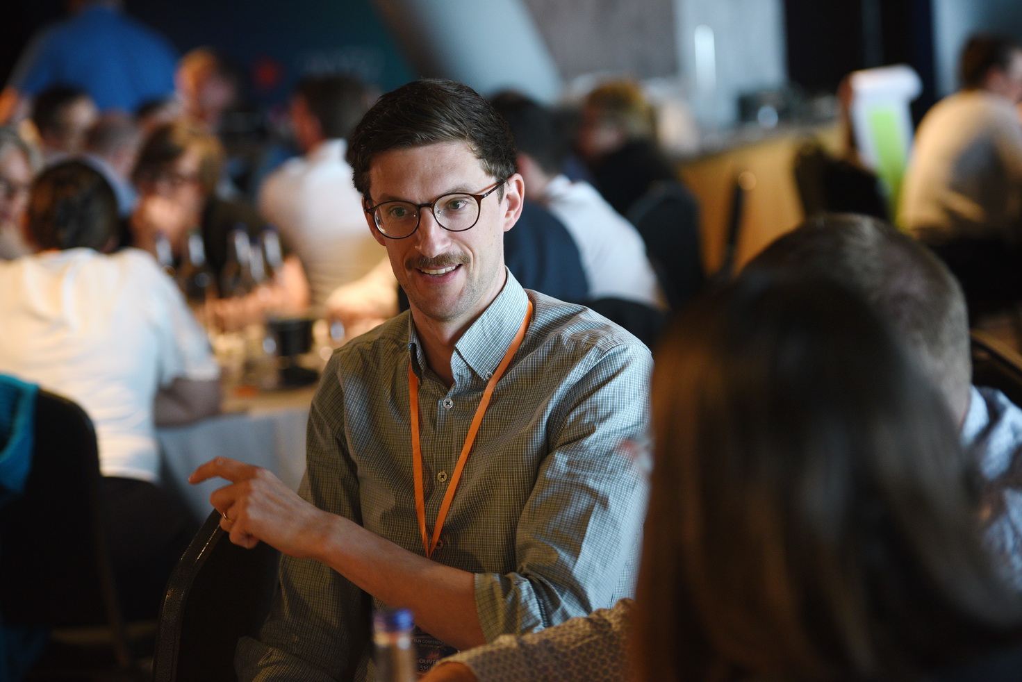 Business discussions at corporate event